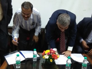 Prof. Shaligram and Prof. Kshirsagar signing MoU as witness. 